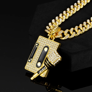 Hip-hop gold Cuban necklace with crystal-encrusted cassette and microphone pendant