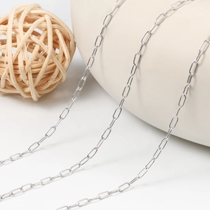 Thin silver stainless steel cross chain for DIY jewelry making on white background