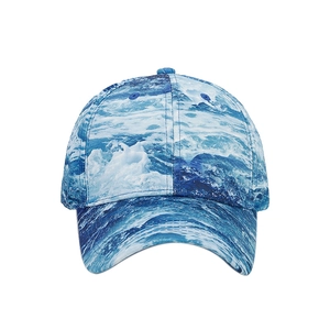 Baseball cap featuring blue and white digital ocean wave print with curved brim for outdoors