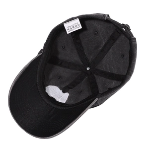 Internal view of 100% cotton washed baseball cap showing stitching and fabric label