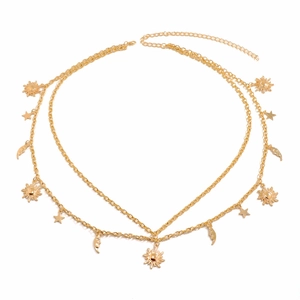 Golden multi-layer star and moon charm waist chain belt with sun pendants on white background