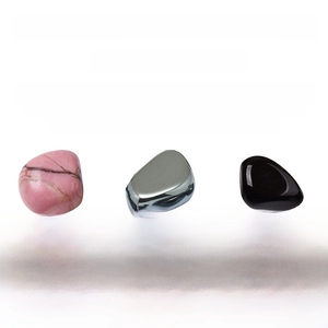 Detail of 8mm pink turquoise, hematite, and obsidian stones for double-layer bracelets