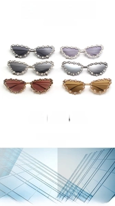 Detail showing various colors of cat-eye sunglasses with rhinestone-encrusted silver frames