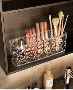 Macro view of transparent acrylic organizer with ripple texture and multi-compartment design