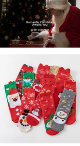 Detail of Christmas cotton socks featuring 3D Santa and reindeer elements with knit patterns