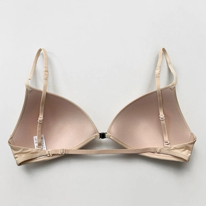 Beige front-buckle triangle bra with adjustable thin straps and a seamless back design