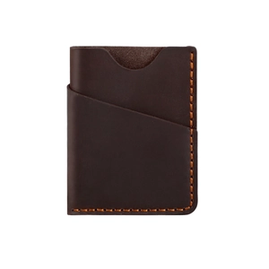 Macro view of vintage brown crazy horse leather card holder with orange contrast stitching