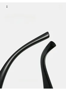 Detail of high-gloss black ergonomic curved sunglasses legs for comfortable wear