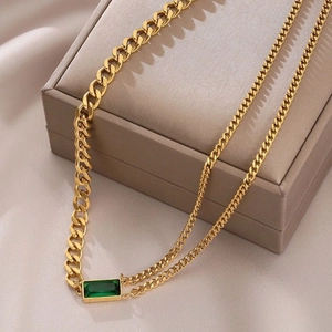 Double-layered gold titanium steel necklace featuring a rectangle emerald zircon pendant