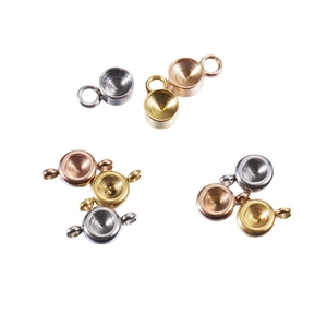 Polished stainless steel round bezel pendant trays in gold, silver and rose gold finishes