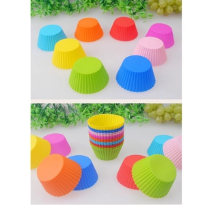 Set of 8 colorful silicone muffin cups with round wavy design for baking and dessert molds