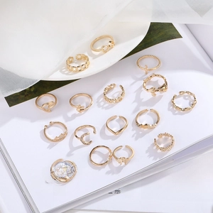 15-piece gold-tone boho ring set featuring heart, butterfly, and moon designs for stacking