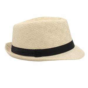 Close-up of a beige straw fedora featuring a fine woven texture and a black ribbon band