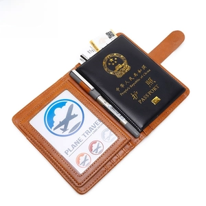 Brown leather RFID blocking passport holder with multi-functional slots and secure strap