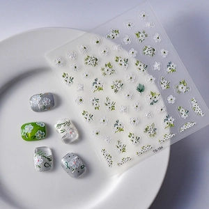 3D embossed floral nail art stickers TS-184 with white daisies and green leaf patterns