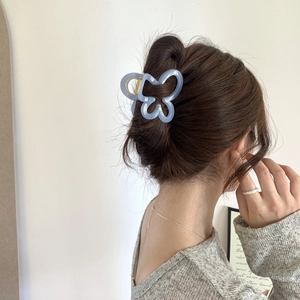 Elegant light blue butterfly hair claw clip for women's hairstyle with golden metal spring
