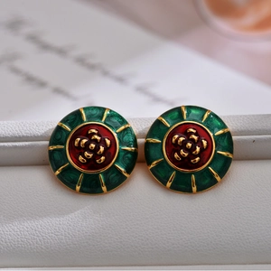 Elegant vintage camellia enamel earrings in gold-plated brass with floral pattern