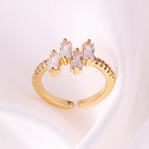 Gold-plated adjustable open ring featuring four rectangular pink and clear zircon stones