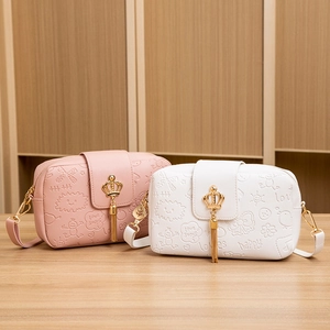 Floral crossbody camera bag with gold crown lock and embossed cartoon leather textures