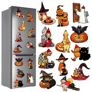 Macro view of vintage Halloween gnome skull magnets on a silver refrigerator surface
