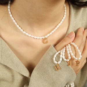 Elegant pearl necklace and bracelet set with personalized gold letter G H J P pendants