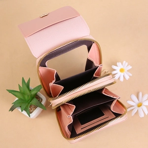 Pink multi-compartment crossbody phone bag with floral flip cover and organized storage