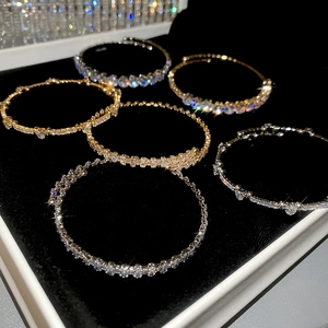 Close-up of six-piece luxury zircon bracelets set in black velvet jewelry box