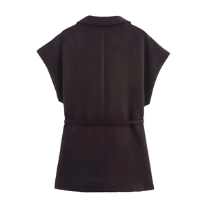 Back view of a tailored dark linen blend vest with a matching belt for waist definition