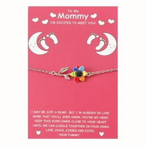 Silver necklace with colorful sunflower pendant on a gift card for expectant mothers