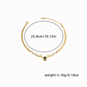 Detail of gold elk bracelet with reindeer antlers and dimensions in inches and centimeters