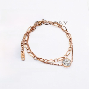 Double-layered rose gold stainless steel bracelet with crystal pavé circle and LK tag