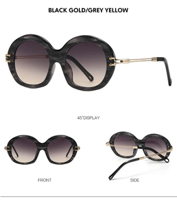 Detailed views of round marble-pattern sunglasses with gold metal temples and dark lenses