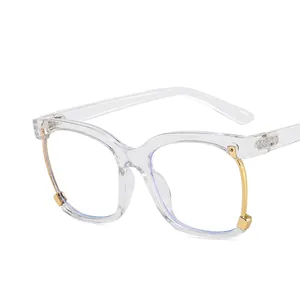 Modern square transparent glasses frame with golden metal accents and clear anti-blue lenses