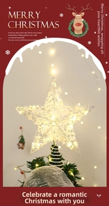 Luminous star tree topper with warm LED lights and mesh texture on red background