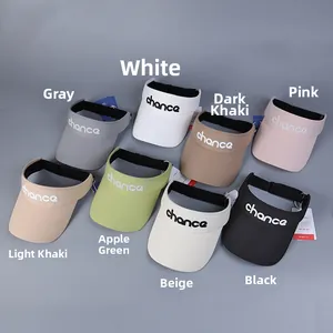 Flat lay of sporty sun visors in eight colors with chance embroidery and adjustable strap
