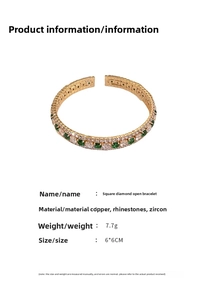 Detailed close-up of emerald square zircon open bangle with gold-plated copper alloy frame