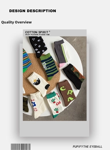 Detailed macro view of assorted cotton mid-calf socks with floral and stripe patterns