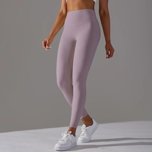 Detailed view of high waisted lavender yoga pants with seamless elastic compression fabric
