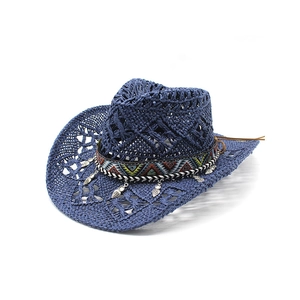 Retro hollow straw cowboy hat in navy blue with ethnic ribbon and silver leaf pendants