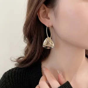 Minimalist silver triangle drop earrings with geometric hollow design for a modern look