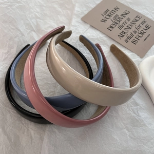 Minimalist glossy PU leather headbands in multiple solid colors with anti-slip lining