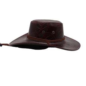 Detail of dark red cowboy hat with leaf vein texture and brown braided rope trim