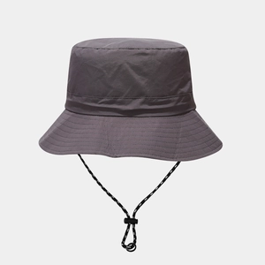 Detail of greyish-purple waterproof bucket hat with adjustable black and white wind cord