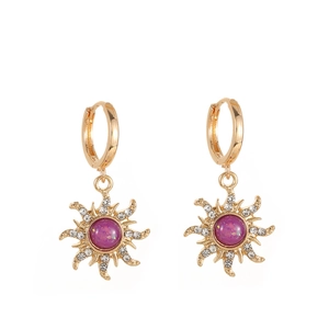 Vintage golden sunburst stud earrings with purple center stone and crystal accents
