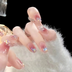 Pink gradient press-on nails with iridescent glitter and sparkling sequins design