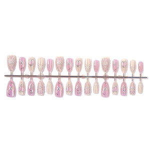 Cat eye press-on nails set with 3D silver embossed heart and star patterns in pink