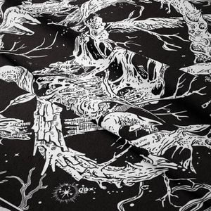Close-up of gothic skull and skeleton patterns on dark bohemian tapestry fabric