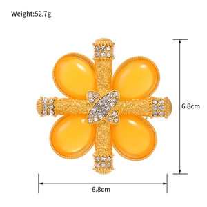 Baroque yellow flower brooch with gold carvings and crystals in a 6.8cm square design
