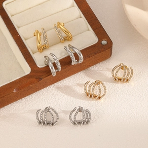 Fashionable stainless steel hoop earrings with sparkling pavé crystals in gold and silver