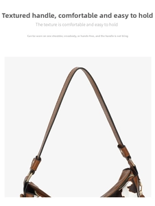 Close-up of textured handle and gold zipper on a brown tote bag with cow print side panel
